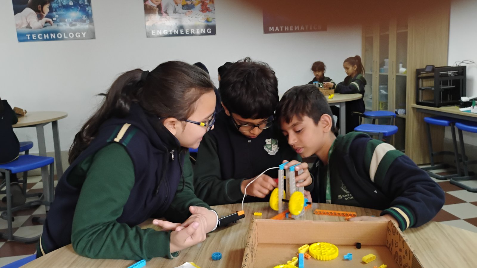 Indian teenagers collaborating on Python and AI projects in a modern school AI and Coding Lab